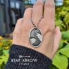 Crows Conversing Oval Pendant